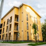 Nurmeksen yhteisöpiha, puu ulkoverhous