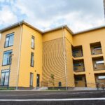 Nurmeksen yhteisöpiha, puu ulkoverhous