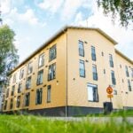 Nurmeksen yhteisöpiha, puu ulkoverhous